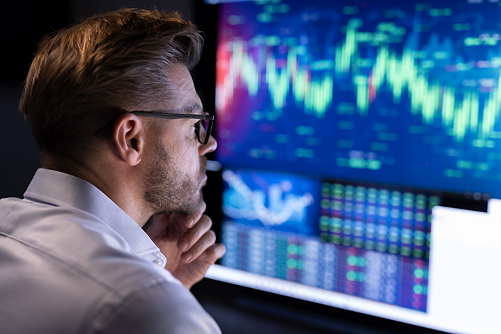 Investors assessing UK financial signals on screen